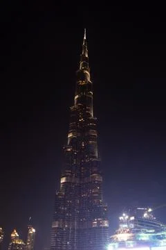 Illuminated Skyscraper at Night Foto stock