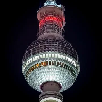 Illuminated Sphere of Berlin TV Tower with Red Light Detail at Night 写真素材