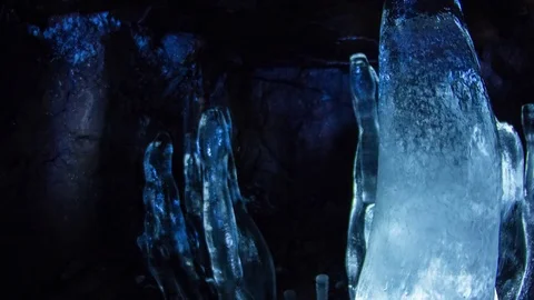 Illuminated stalagmite Icicles in cave Stock Footage 72804116