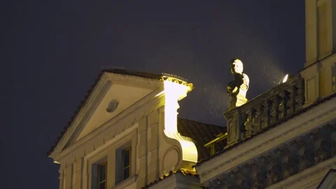 Illuminated statue on ancient facade in Prague Stock Footage 143380827