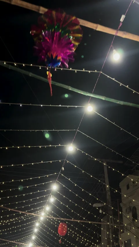 Illuminated Street with String Lights and Bulbs Stock Footage 334557142