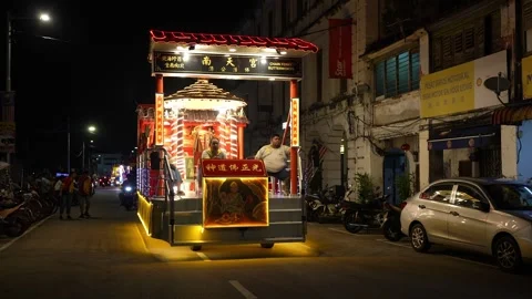 Illuminated Taoist Procession Float Traveling Through Butterworth at Night Video stock 346245440