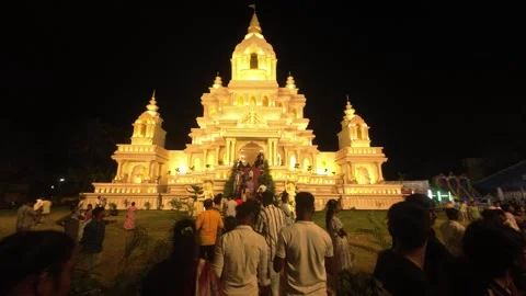Illuminated Temple and Crowd During Night Festival Celebration Stock Footage 318520592