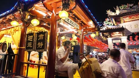 Illuminated temple float procession during nine emperor gods festival Stock Footage 347896794