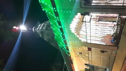 Illuminated Temple with Moving Light Beam at Night in India 動画素材 332213630