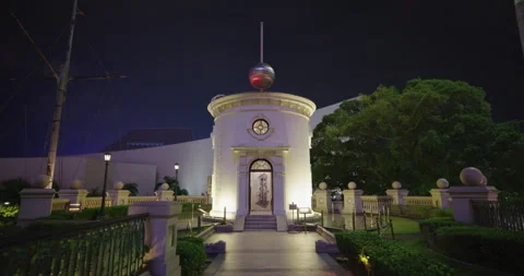 Illuminated Time Ball Tower with Hong Kong Cultural Centre Seen in the Back Video stock 282546236