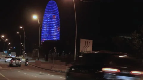 Illuminated Torre Glories Also Known As Agbar Tower In Barcelona, Spain Stock Footage 145332873