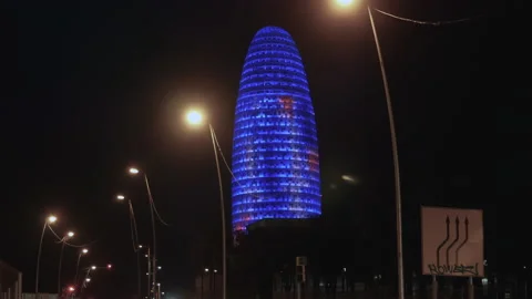 Illuminated Torre Glories Also Known As Agbar Tower In Barcelona, Spain Stock Footage 145332912