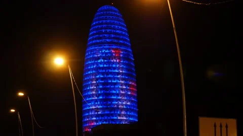 Illuminated Torre Glories Also Known As Agbar Tower In Barcelona, Spain Stock Footage 145332977