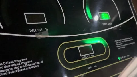 Illuminated Treadmill Console Display with Workout Metrics Stock Footage 307797009
