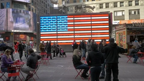 Illuminated US flag in Times Square, New York Stock Footage 87054098