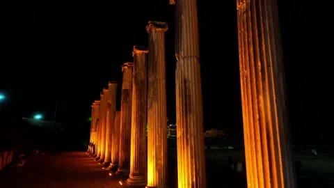 Illuminated view of historical columns in the ancient city of Asklepion, the Stock Footage 241797878