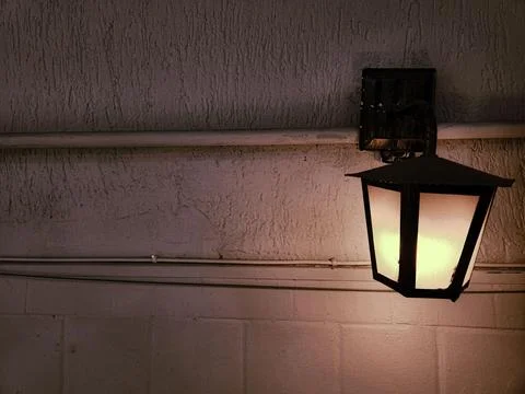 Illuminated wall lantern Stock Photos