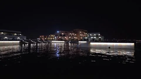 Illuminated Waterfront Architecture in Doha Stock Footage 337044623