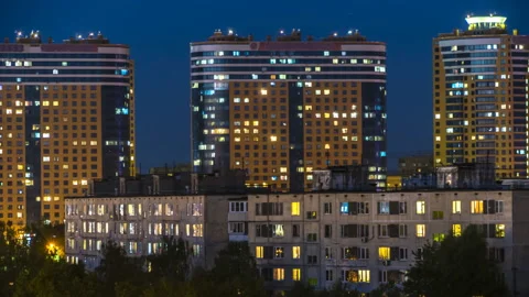 Illuminated windows of dwelling house time lapse Stock Footage 89658949