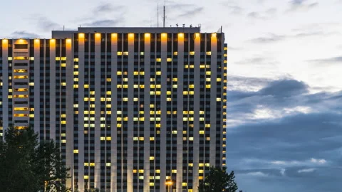 Illuminated windows of hotel , time lapse Stock Footage 93532173