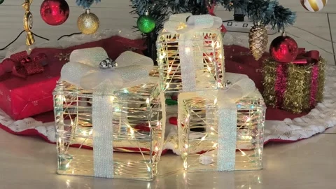 Illuminated wireframe Christmas gift boxes Stock Footage 324835101