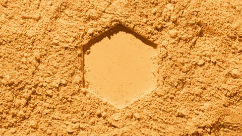 Illuminated yellow powder surface with hexagonal pattern Stock Footage 341117382