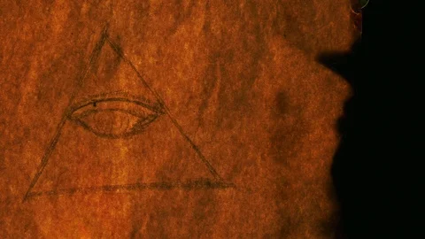 Illuminati Symbol on Old Paper Burning Stock Footage