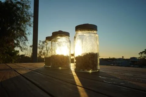 Illuminating jars Stock Photos