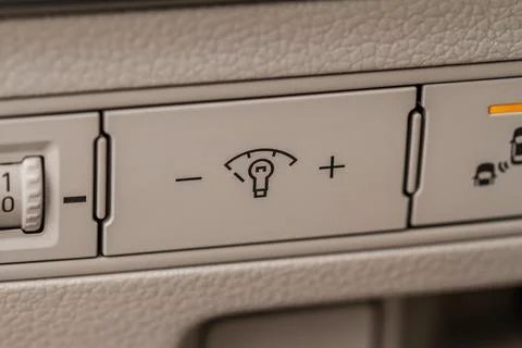 The illumination control switch to adjust the brightness of the instrument pa Stock Photos