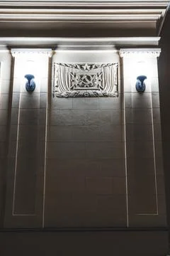 Illumination of the facade of a post-Soviet building at night. USSR Stock Photos