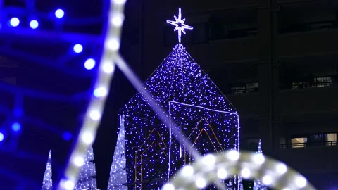 Illumination square in front of a Japanese station Stock Footage 124621070