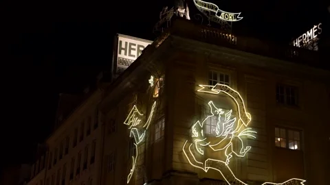 Illuminations building facade in Christmas time. Paris by night. Tilt 4K 库存影片 300346070