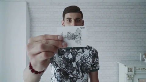 Illusionist hands showing tricks with playing cards Stock Footage 79767274