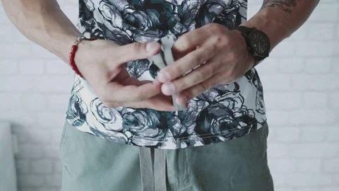 Illusionist hands showing tricks with playing cards Stock Footage 79858814