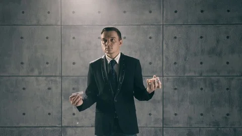 Illusionist performing card trick Stock Footage 83798686