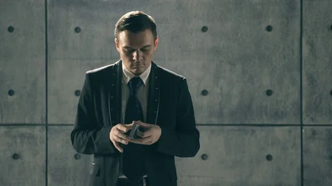 Illusionist performing card trick Stock Footage 83855994
