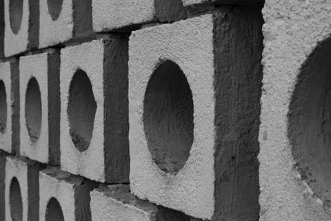 Illusory wall made of big gray bricks by bricklayer Photos