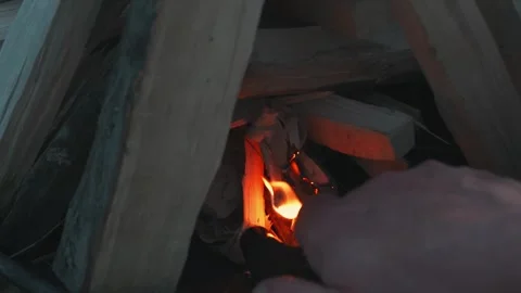 An Illustrated Guide to Creating a Campfire at Twilight Detailed Timber Ignition Stock Footage 276546119