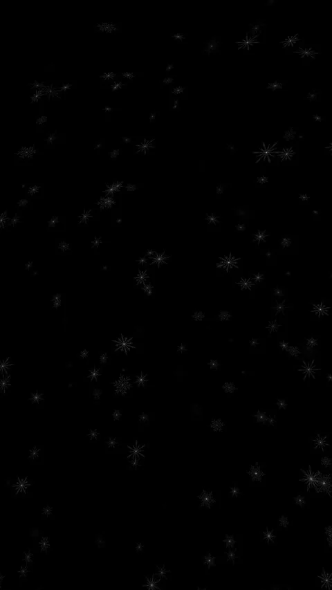 Illustrated snowflakes falling down on clean black vertical background Stock Footage 345683751