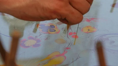 Illustrating trees and flowers using Oil on water art / Ebru / paper marbling Stock Footage 112005330