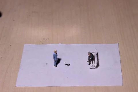 Illustration, different perspective makes another value, sitting at paperclip Stock Photos