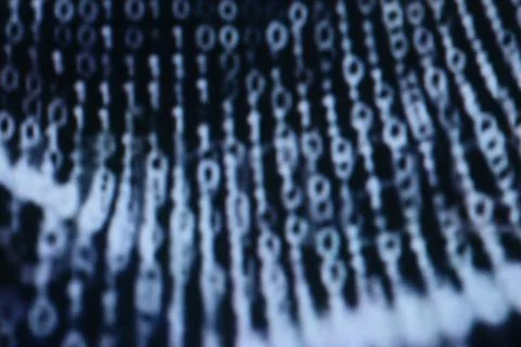 Illustration of running binary codes on a dark blurry background Illustrazione stock