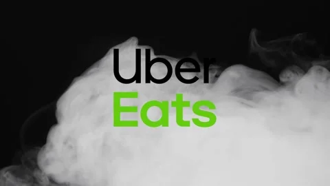Illustrative editorial of Uber Eats icon appearing when white smoke flies Stock Footage 148388426