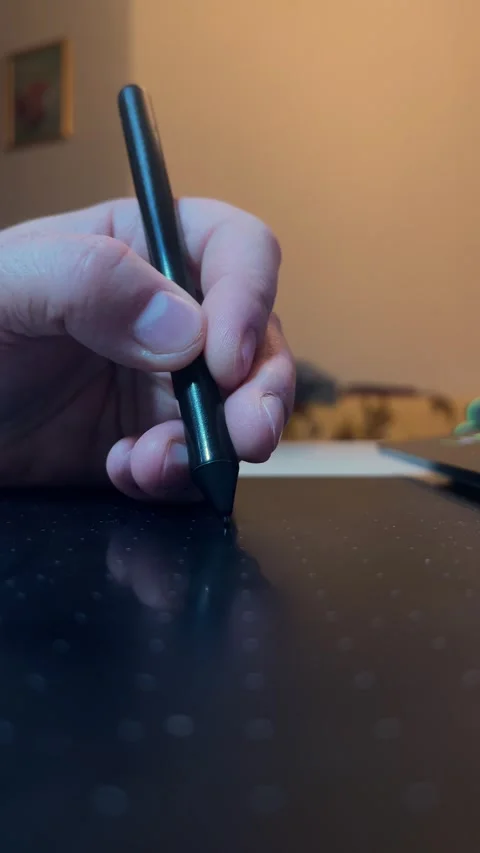 Illustrator, artist, painter draws on black graphics tablet Stock Footage 297210371