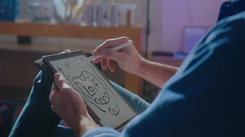 Illustrator Drawing on Digital Tablet in Art Studio Stock Footage 247349171