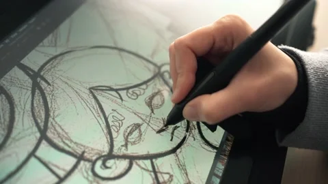 Illustrator working as a full-time free Stock Footage 130217576