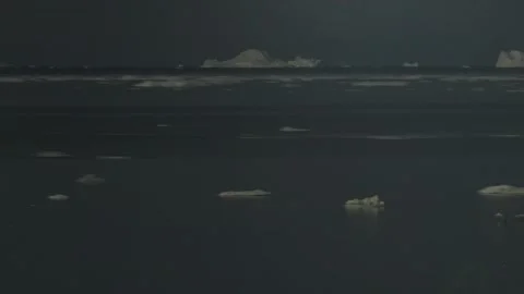 Ilulissat Iceberg Timelapse From Darkness Back to Daylight Stock Footage 345454069