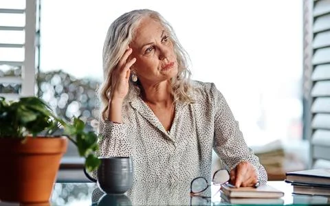 Im afraid this may not be working out. an attractive senior businesswoman Foto stock