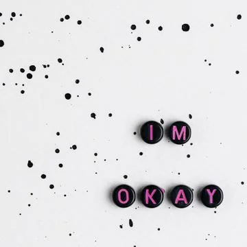 IM OKAY beads text typography on abstract background Stock Photos