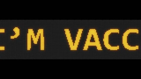 I'm vaccinated. Loop corona virus LED running text. Stock Footage 156097083
