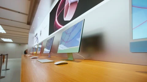 IMac computers on different color at Apple Store, Barcelona, Spain, 19 Oct 2023 Stock Footage 253606944