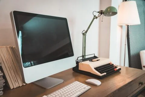 IMac pro (computer) in a workstation at home office. Stock Photos