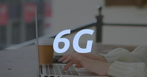 Image of 6g text over hands using laptop 写真素材