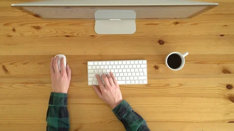 Image from above of left-hand man playing games during the day. Stock Footage 128773248